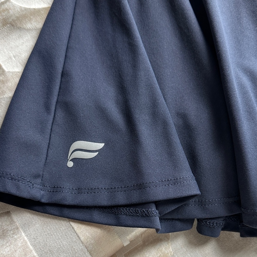 Stylish Navy Fabletics Sport Skirt with inbuilt shorts. Size L - Picture 3 of 3